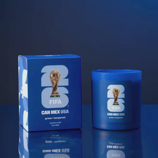 Blue candle and box with FIFA World Cup trophy design on a blue background spinning.