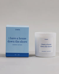 I Have A House Down The Shore candle box spinning next to the candle.