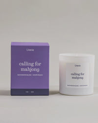 Calling For Mahjong candle box spinning next to the candle.
