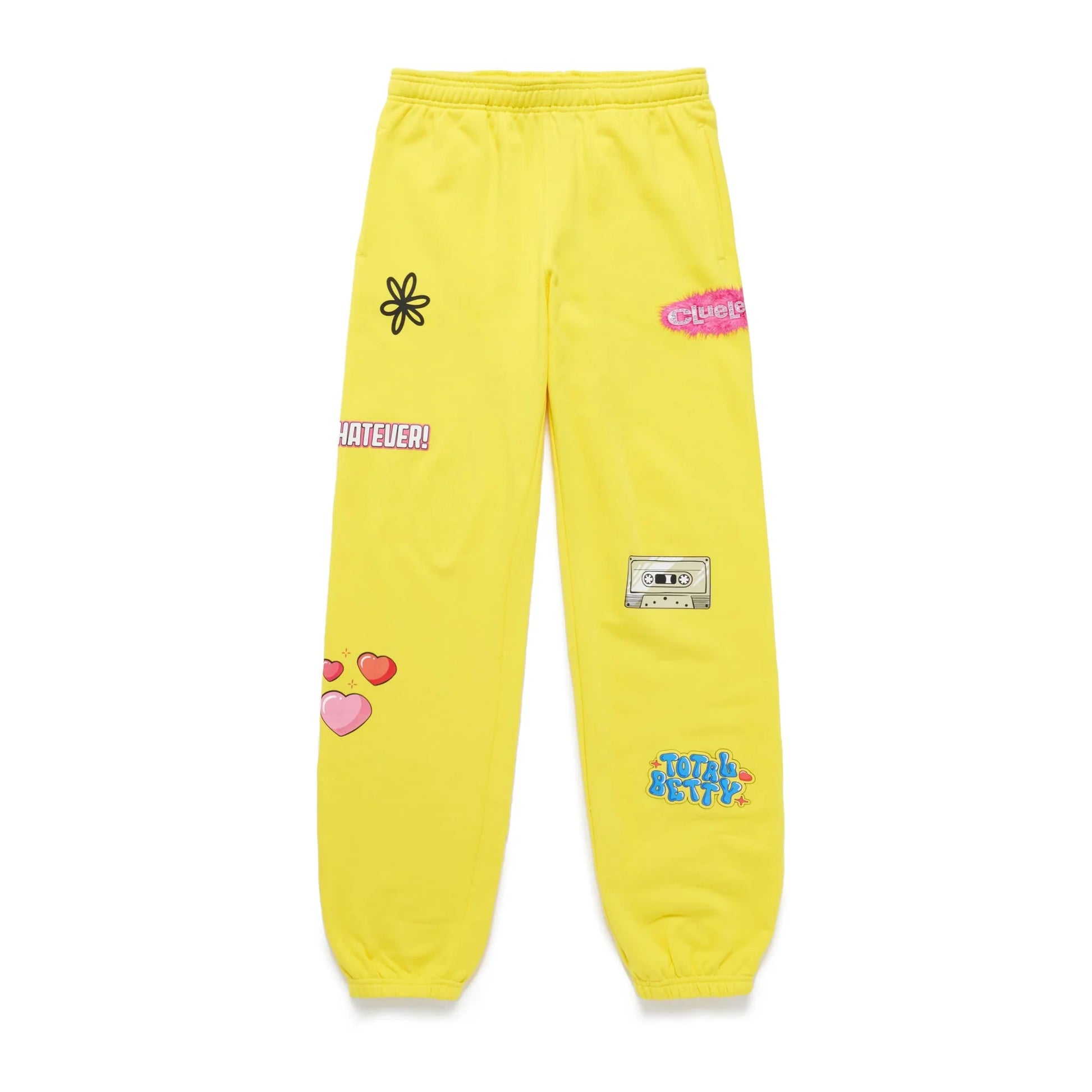 Yellow Clueless sweatpants by Samii Ryan with various patches.