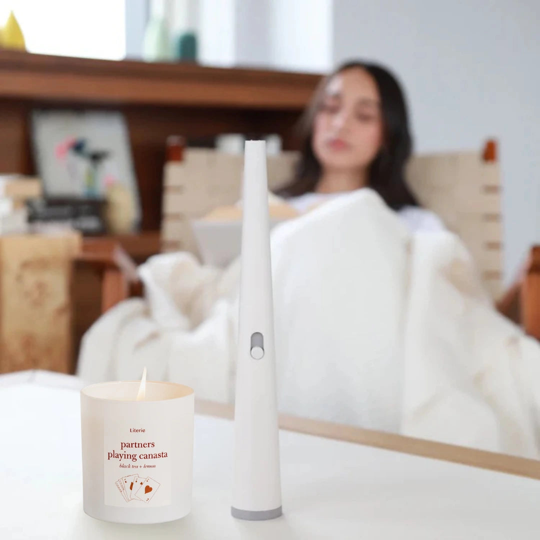 Luma Flume electric lighter with Literie Canasta candle.
