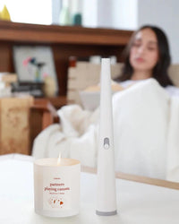 Luma Flume electric lighter with Literie Canasta candle.