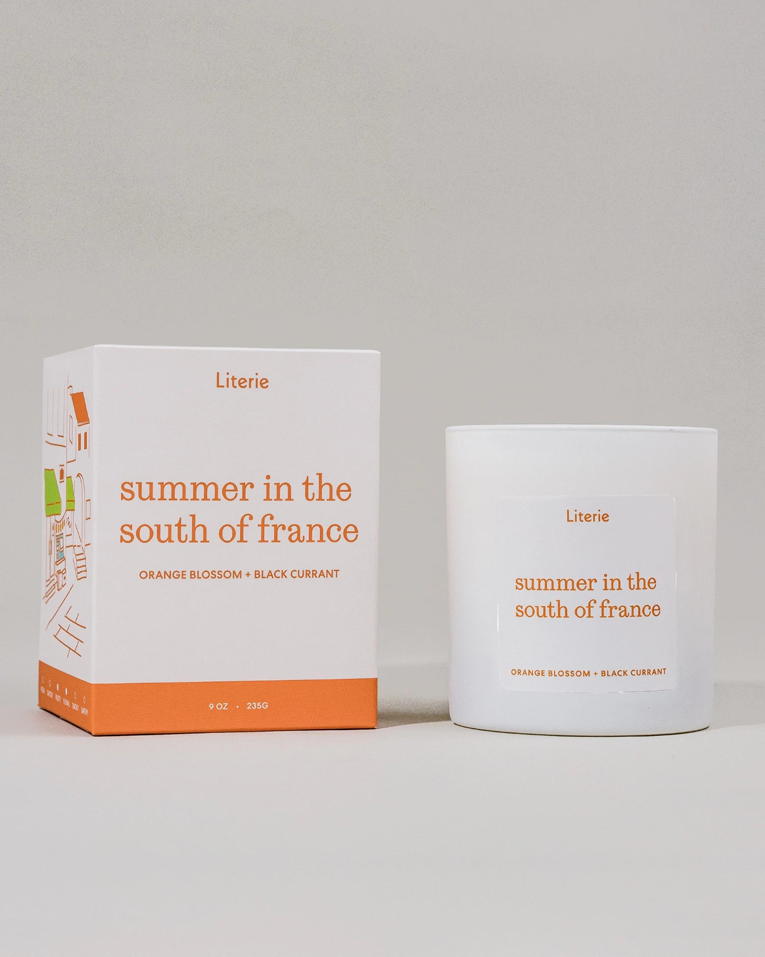 Candle and packaging of 'Summer in the South of France' by Literie on a light gray background