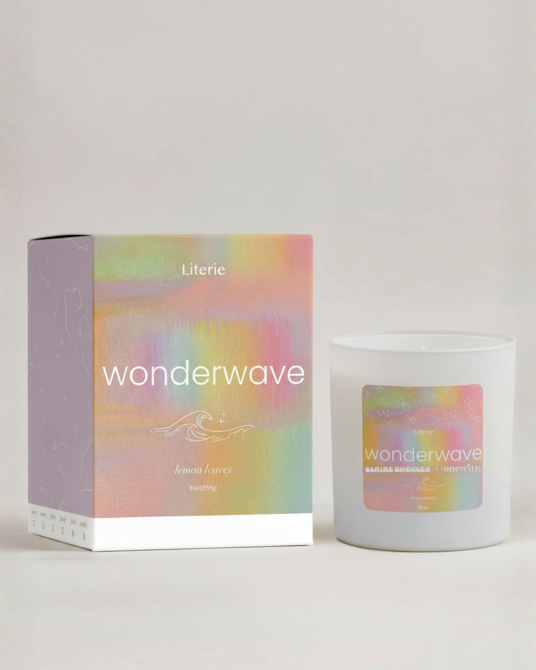 onewith x claire buckley candle and packaging with 'wonderwave' branding on a light background