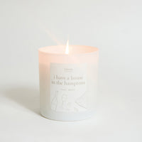 Candle with a label on a white background
